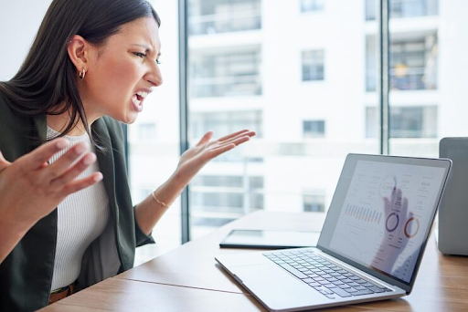 Frustrated business owner reviewing website analytics